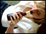 Posed image of a teenager drinking alcohol