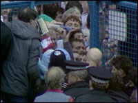 Fans exit through gate