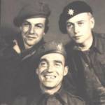 Seamus[Jimmy] Morris is here top right photographed for a newspaper upon liberation. With him are an American Airman in borrowed uniform and another [unknown].