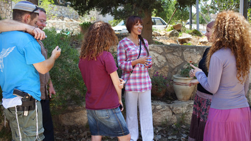Reya El Salahi (centre) visits the Jewish settlement of Itamar in the West Bank and meets the Goldschmit Family.