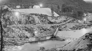 Black and white view of construction site of Pitlochry Dam.