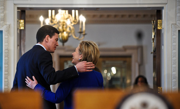 Touchy-feely David Miliband and Hilary Clinton
