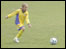 Girl footballer kicking a ball