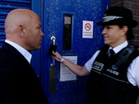 Dom Littlewood and policewoman