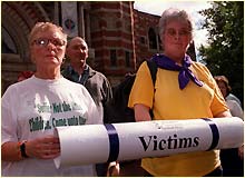 Protesters present a petition against the Catholic Church's faliure to tackle paedohile priests.