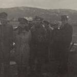 Pilot, S/L Morrow, Navigator, P/O Tamhlym, Radio Operator, F/S McLaughlin, and Fr. William Hennebury standing along side the Boston BZ 277 in Conche, Newfoundland, 1942