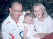 Andrew with wife Katrina and daughter Emilyn