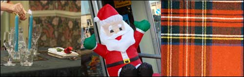 Red roses and candles, red and green Christmas decorations and tartan cloth.