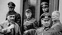 Colonel General Von Falkenhorst, right, and Field Marshal Baron Mannerheim review Finland's armed forces