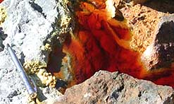 The acid waters of the Rio Tinto in Spain run red