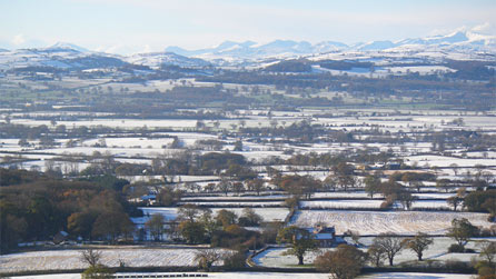 Snowdon and surrounding mountains from Cwm overlooking the Vale of Clwyd by Matthew Griffith.