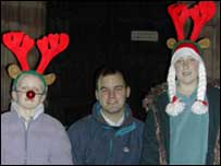 Andrew Easton and two girls dressed as reindeer