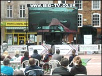 Watching the race at market square.