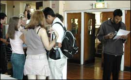 Teenagers getting A Level results