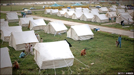 Internally Displaced Persons (IDPs) from military operations in Swat, Buner and Lower Dir set up their tent at a relief camp on May 10, 2009 in Malakand, Pakistan