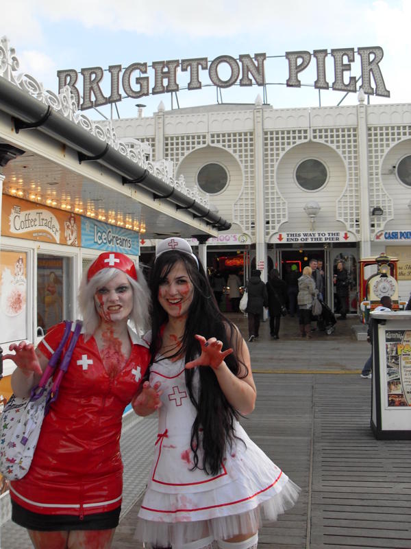 two girls dressed as zombie nurses on brighton pier