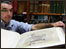 Andrew Morrison with the rare book discovered at the Yorkshire Museum