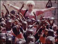 Mae with some of the African children she's helping