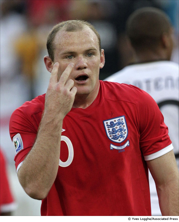 England's Wayne Rooney gestures to referee Jorge Larrionda