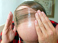 Thruster tends to his thatch