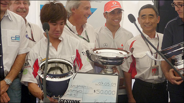 Lewis Hamilton helps present awards