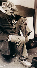 man putting on work shoes