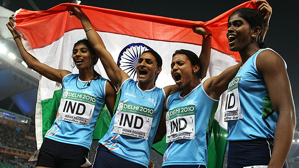 The Indian 4x400 relay team celebrates winning gold at the Commonwealth Games