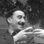 Chas enjoying a drink (possibly Christmas 1944).