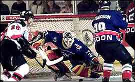 Professional ice hockey players in action 