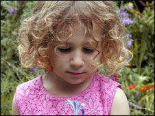 a girl wearing pink