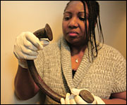 Manilla held by woman