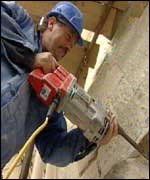 Stone mason works on cathedral