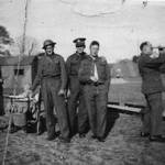 The group shot shows my mother-in-law, Nancy Anderson, to the left of the picture, with my husband in the pram and soldiers from the camp at St Ives.