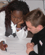 Bisi and Arnaud working on their show