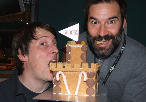 Adam and Joe eating the gingerbread Big British Castle.