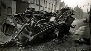 A fire engine crushed by masonry after the Cheaspside Street fire blast