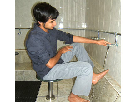 The left foot is washed.