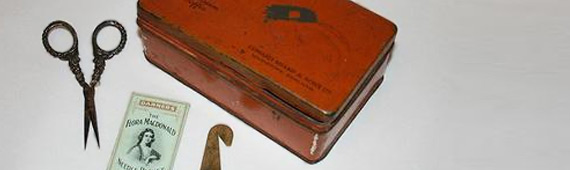 A toffee tin sewing kit