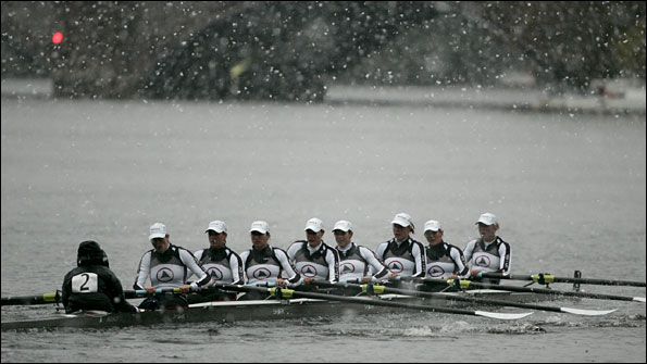 Annabel Vernon (fourth from right) and Anna Watkins (behind her) take part in the Head of the Charles