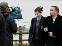 man and girl being filmed