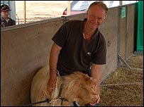 Peter Girard with one of his Golden Guernsey Goats