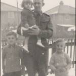 Possibly Middleburg Street, East Hull. George with his 3 children.