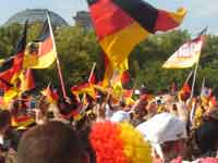 Wigs, flags and the top of the Reichstag building