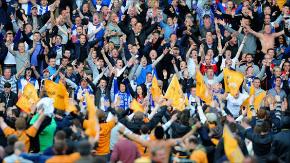 Wolves and Blackburn fans celebrate their Premier League survival