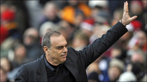 Avram Grant acknowledges the crowd during the valuable West Ham win at Fulham