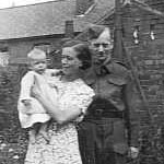 My mom, Nelly and my dad Cyril and me about 6 months old.