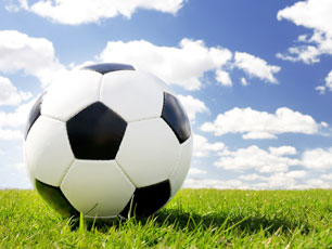 Football on grass (Image: Rene Mansi/iStockphoto) Football on grass (Image: Rene Mansi/iStockphoto)