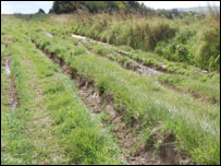 Deep ruts caused by vehicles