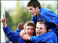 Chasetown players celebrate goal against Cardiff