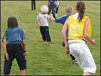 Youngsters playing football